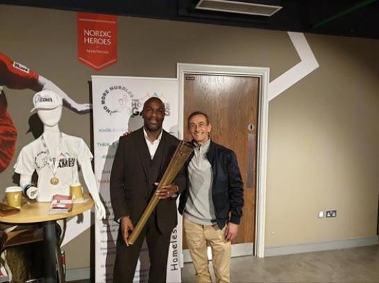 Derek-Redmond-with-Olympic-Torch-at-Liverpool-Business-Fair