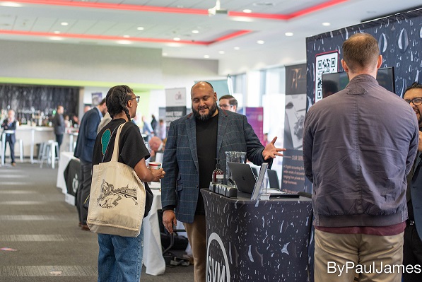 Studio-Vega-Myst-talking-visitor-Manchester-Biz-Fair-2022